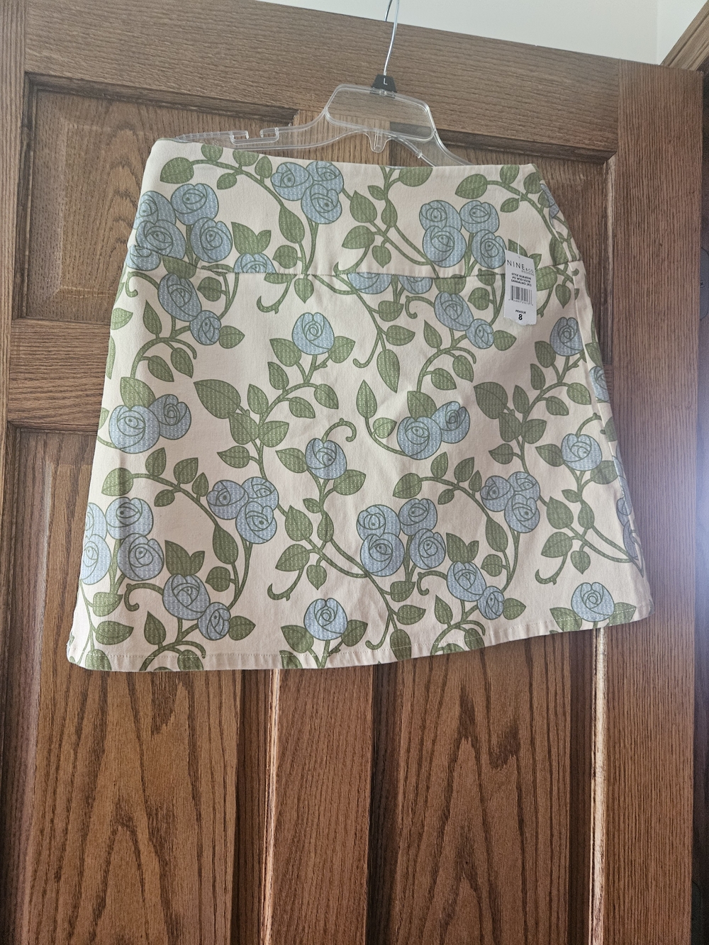 Nine & Co. Cream Mini Skirt with Light Blue Floral Vine Print